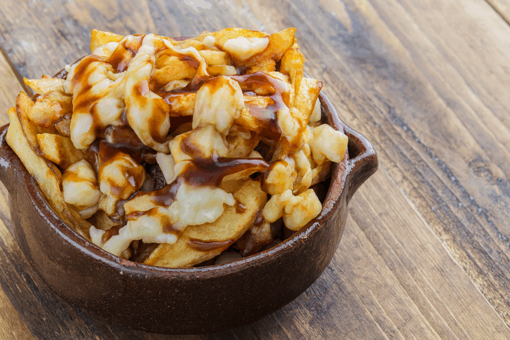Traditional Canadian poutine dish with fries, cheese curds, and gravy