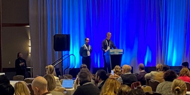 Interpro speaking at a conference showcasing RSI